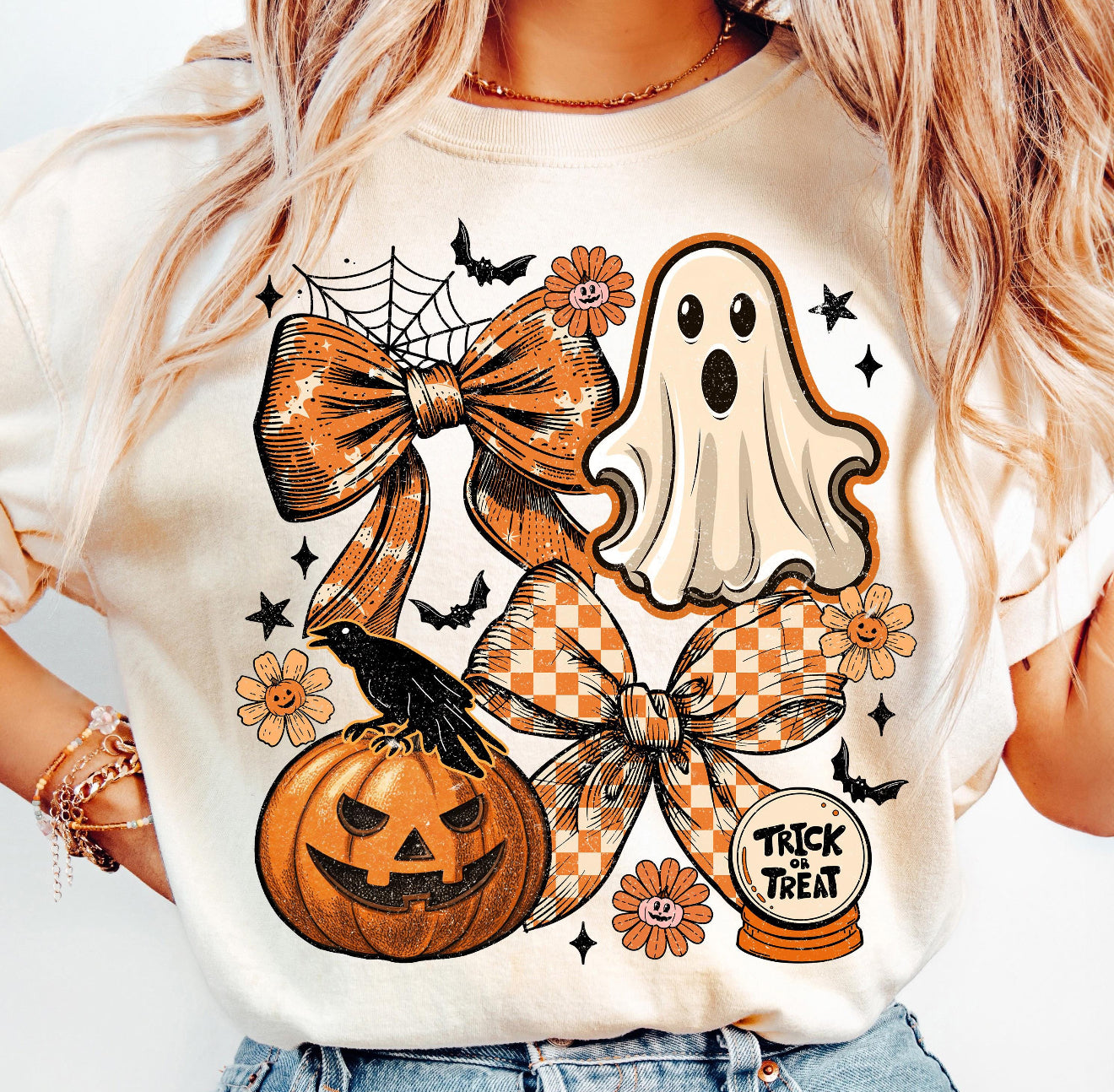 Trick or treat ghost with orange bows and a pumpkin with crow