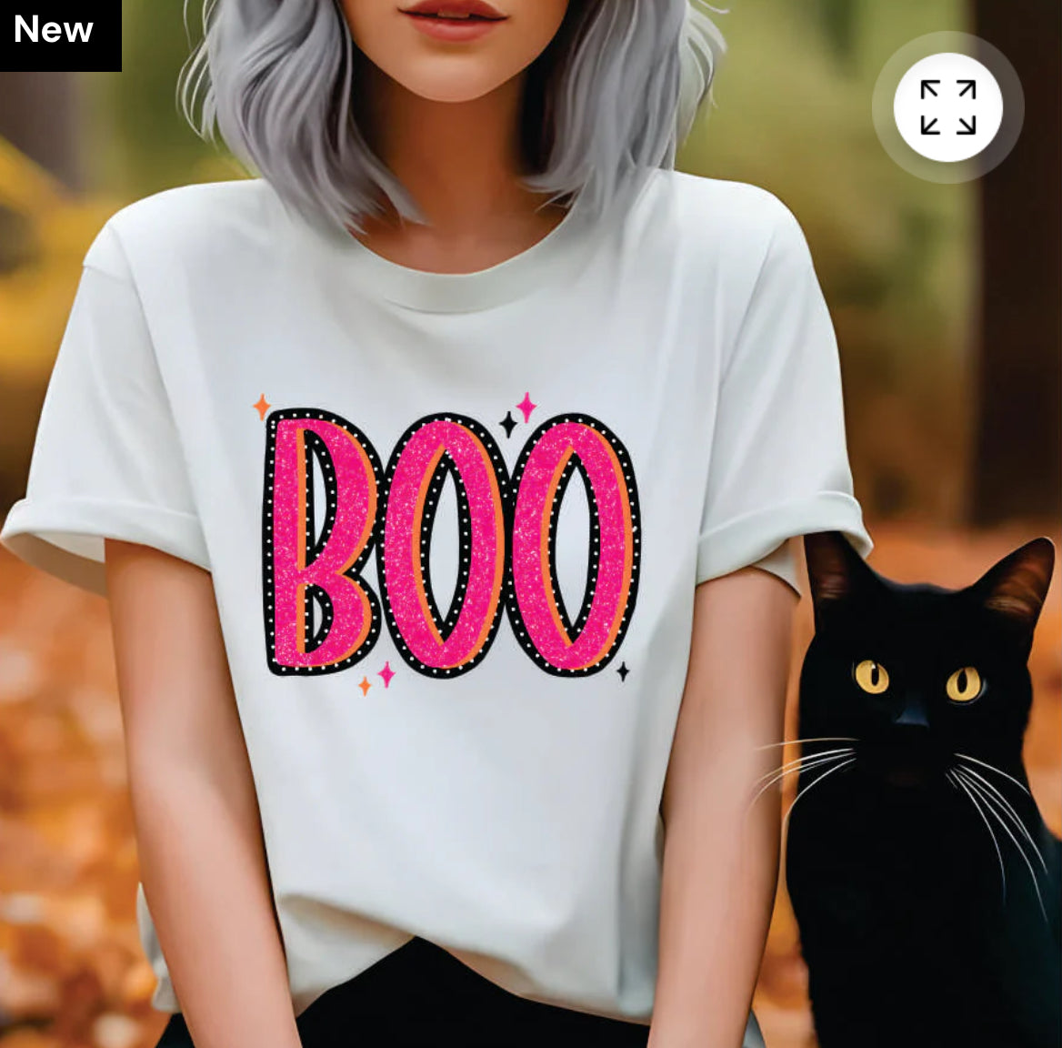 Pink boo outlined in black with orange 