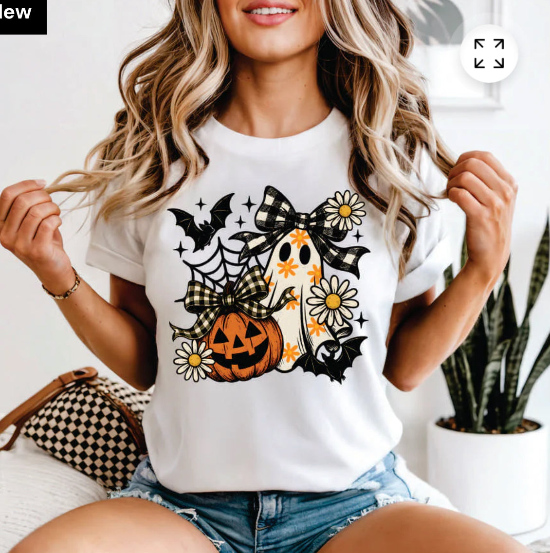 Flower ghost with bats and a pumpkin